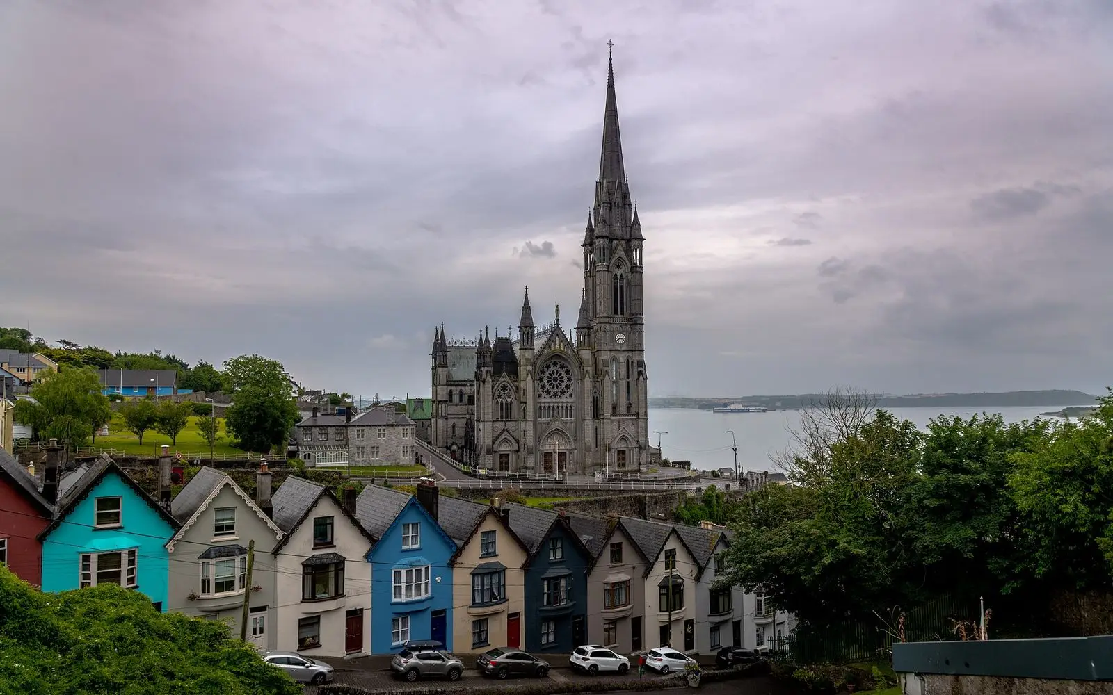 St Colman's Cathedral above the colourful houses of Cobh in Cork Harbour, Ireland