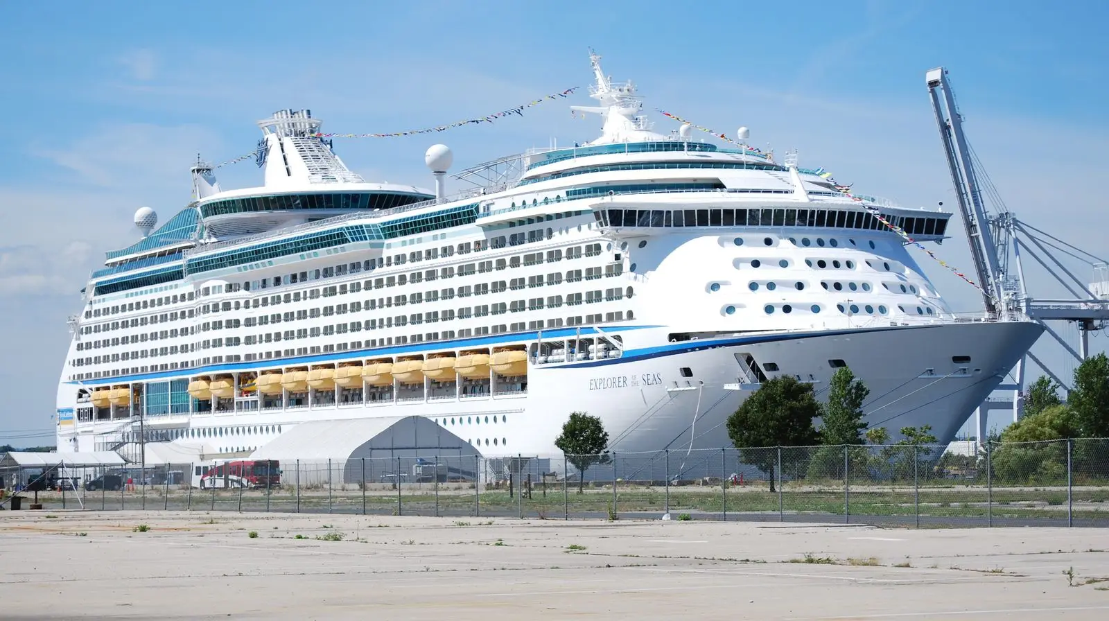 Royal Caribbean's Explorer of the Seas docked at Cape Liberty in Bayonne, New Jersey, in August 2008, with a container crane behind it